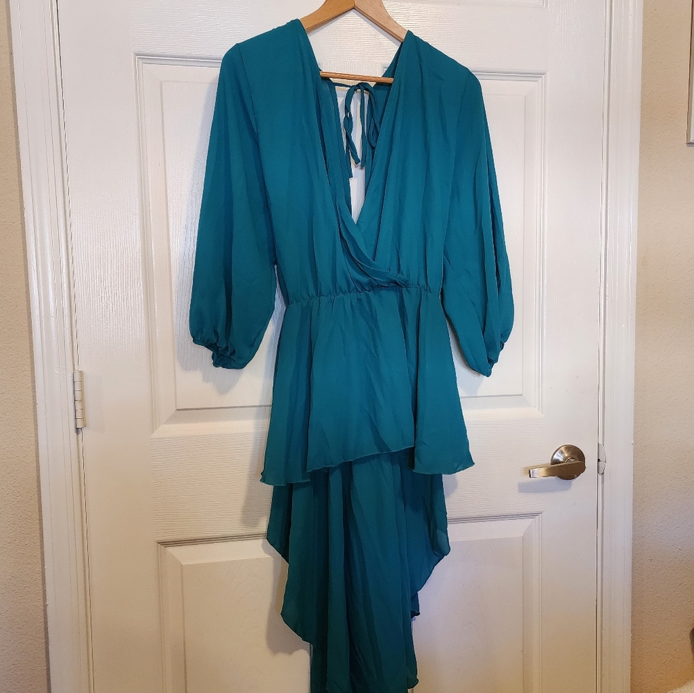 Teal high low open back low cut top